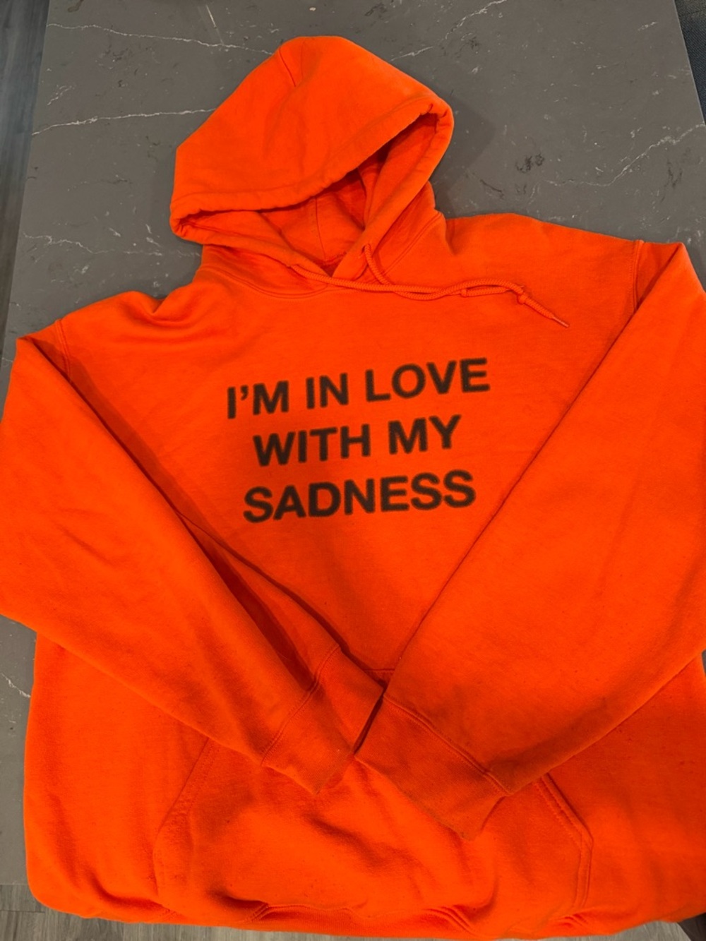 Anti Social Social Club Orange Crewneck Hoodie with Bold Front Graphic